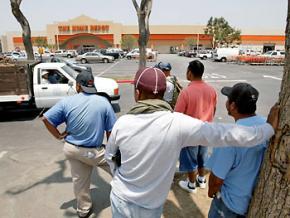 Day laborers wait for work